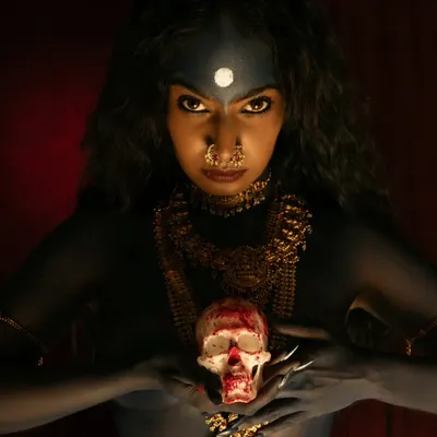 A powerful interpretation of the goddess Kali, exploring themes of fury and freedom. I used intense, focused lighting and a deep red background to create a dramatic and spiritually resonant image.
