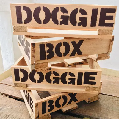These sturdy wooden 'Doggie Box' crates are ready to be filled with fresh treats and delivered to your door. They are also reusable for storing toys or anything else you can think of.
