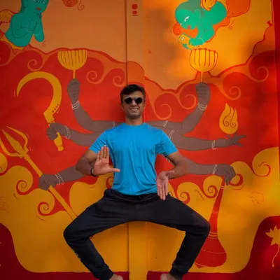 Welcome to The Punyah Theatre! I'm standing in front of the incredible mural that greets our visitors, a vibrant piece of art that sets the creative tone for our space.