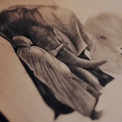 A peek at a piece I never completed. This is a surrealist pencil sketch of a person embracing an elephant, showing a work in progress.