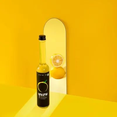 A creative and conceptual shot for Sprig's Yuzu Citrus Extract. I used a mirror and a strong monochromatic color scheme to create a visually arresting image that tells a story of flavor and freshness, perfect for brands looking to make a bold statement.
