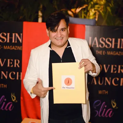 At the launch of Jasshn E-Magazine, holding a copy featuring an article about my work. I'm blessed to be recognized by fashion publications.