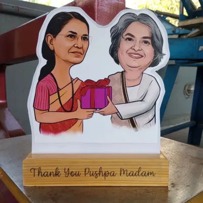 These caricature cut-outs are a fantastic way to say "thank you." Here, one was gifted to "Pushpa Madam," making for a very personal and memorable token of appreciation.