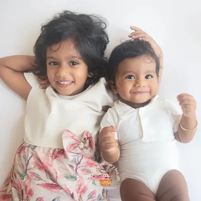 The bond between siblings is one of a kind. I love capturing these sweet, relaxed moments between them. Look at those two beautiful smiles.
