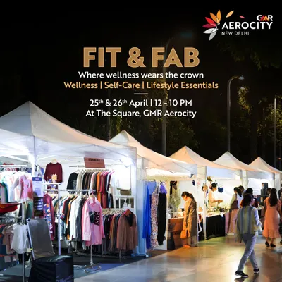 A nighttime view of the bustling 'Fit & Fab' wellness and lifestyle pop-up market at The Square. This image showcases a stylish shopping experience where self-care meets retail therapy.