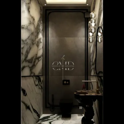 This powder room is a masterclass in drama and luxury. I used book-matched marble with striking veins, a sculptural pedestal sink, and a statement chandelier to create an unforgettable experience for guests in this Noida penthouse.