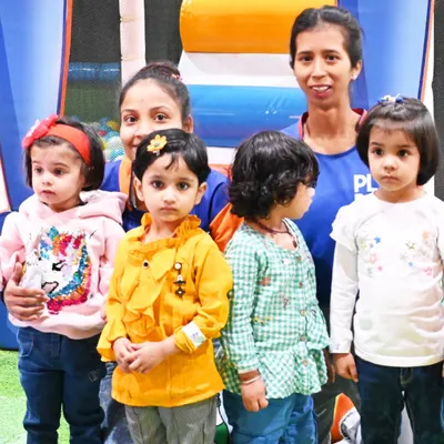 Our staff with a group of adorable toddlers during a group visit. We ensure a safe and fun time for even our smallest guests.