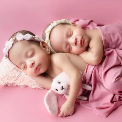 What can I say, the picture says it all. Sharing a womb and now forever sharing every experience in this world. Capturing the bond between newborn twins is truly magical.