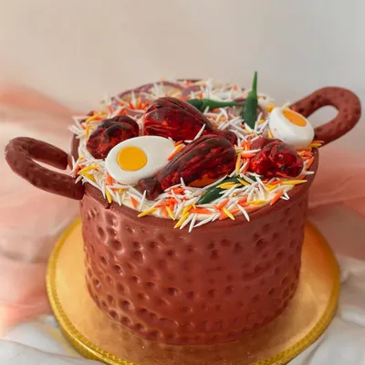 Another look at my signature Biryani pot cake. It's a flavourful, layered cake completely disguised as a savoury dish, making it a fun surprise for any celebration.