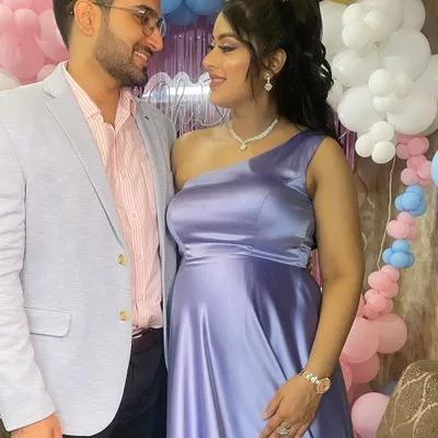 Getting this mother-to-be ready for her baby shower was so special. Here she is with her partner, both looking forward to their new arrival.