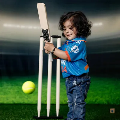 For the future cricket star. This little one is ready for his debut in a full Team India kit, complete with a bat and wickets. This cricket theme is a huge hit with sports-loving families.
