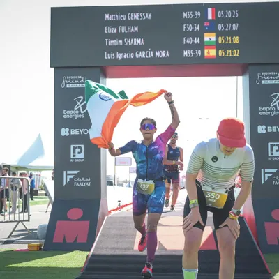 Crossing the finish line at Ironman Bahrain 70.3 with my time on the board. This was my first international 70.3, and earning a podium spot in my age category was a huge boost.