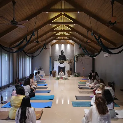 A wide view of a recent workshop, where we explored the connection between yoga and hormone health. The energy of a group practicing together creates a powerful environment for learning and transformation.