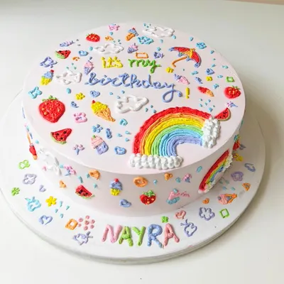 Another view of the beautiful, hand-piped doodle art cake, showing the details that wrap all the way around the tiers.