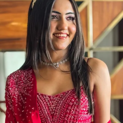 A stunning party-ready look. I created this glamorous style with soft, face-framing hair, a jeweled headband, and flawless makeup that highlights her features.