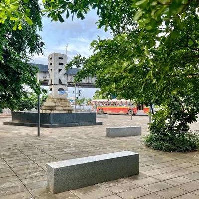 The BKC Plaza in Mumbai, a project designed to give the city a new public lung. We incorporated simple, durable stone benches and a canopy of native trees to provide shade and rest for pedestrians in this busy commercial district.