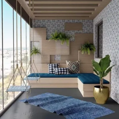 This unique enclosed balcony features two hanging swing seats and a built-in bench, all with bold blue cushions. The design is defined by patterned wall tiles and a creative wooden wall structure that doubles as a planter.