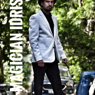 A professional portrait taken outdoors. I believe a magician's art is as much for the audience as it is for the artist, and I always aim to look the part of a modern, engaging entertainer.