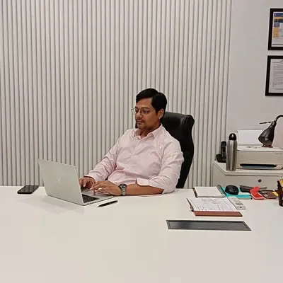 This is me, Ketan Jhari, in my office in Malviya Nagar. I invite clients to come to our studio to discuss their projects, explore materials, and see how we work.