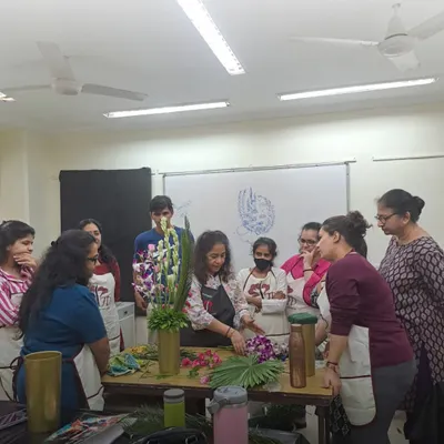 A glimpse into our classroom where I am demonstrating a technique to an attentive group. Our small class sizes ensure every student gets personalized feedback and can ask questions freely.