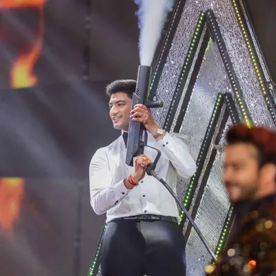 This groom brought the energy of a Bollywood hero to the stage. We amped up his performance with a CO2 gun prop, giving his act an extra blast of fun and making it a total crowd-pleaser.