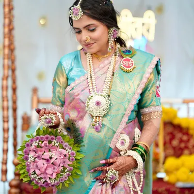 Glowing into motherhood. For her Godh Bharai (baby shower), I created a soft and radiant makeup look to enhance her natural warmth and joy, paired with a beautiful pastel nauvari saree and floral jewellery.
