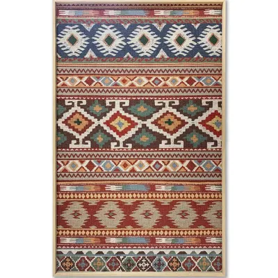 This entire tribal-patterned rug is framed as a single, impactful piece of art. The simple, light wood floater frame contains the textile without a mat, allowing the vibrant colors and patterns to extend to the very edge.