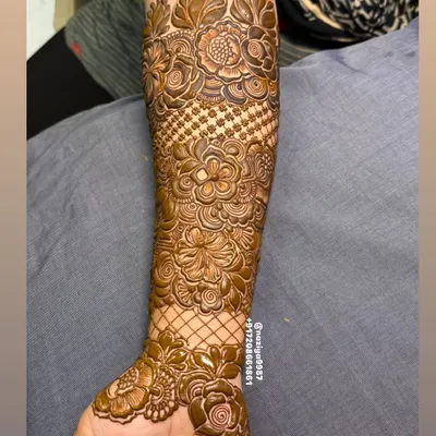 The fresh paste of a full arm design. You can see the different textures created by using fine lines, dots, and bold filled areas.