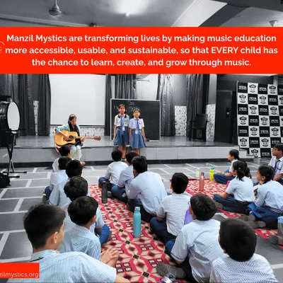 This is our mission in action. An instructor leads a music session in a school, creating an accessible and joyful learning environment where every child has the chance to grow through music.
