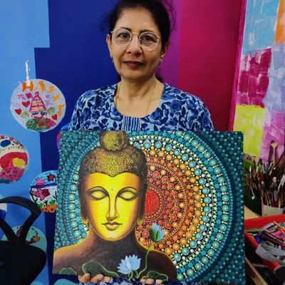 This participant, who hadn't painted in 30 years, created this breathtaking Buddha artwork. Combining acrylic painting for the face and intricate dot art for the mandala background, it’s a testament to the creativity that lies within us all.