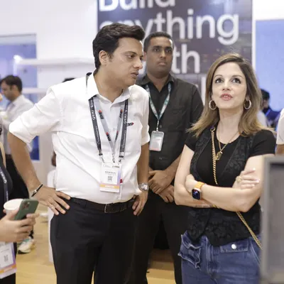 Renowned designer Sussanne Khan exploring the latest innovations on the expo floor, showing keen interest in the technology on display.