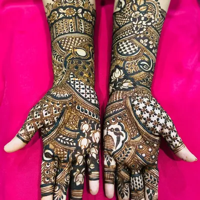 This is a classic, full-coverage traditional design. It is rich with details, including peacock and floral elements, checkerboard patterns, and fine lines, creating a stunning and elaborate look.