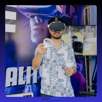 A player gets ready to enter the virtual world. With a VR headset and controllers, you have complete freedom to interact with the game, making for a truly immersive experience.