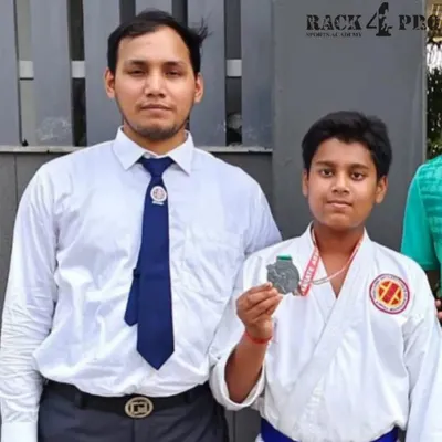 A proud moment for our student and his coach after winning a silver medal at the Open NCR Karate Championship 2024. This is a testament to their shared dedication.