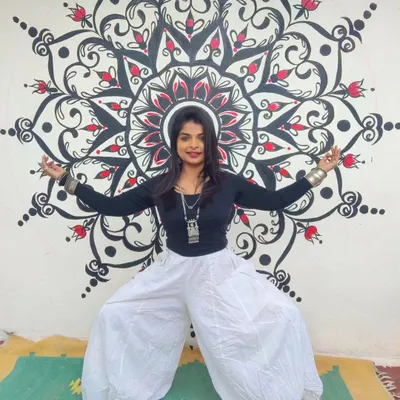 The Goddess Pose is fantastic for building lower body strength and opening the hips. In my classes, we hold postures like this to cultivate stability and find power in stillness, all while connecting to our breath.