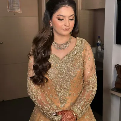 This is the soft glam magic I love to create. Her request was to look like herself, but more radiant, so I focused on a flawless base, soft contour, and shimmery eyeshadow for a timeless engagement look.