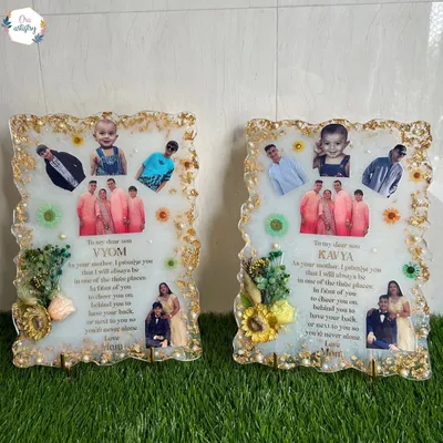 A matching set of personalized resin frames, created as a gift from a mother to her sons. Each frame includes a heartfelt message and a collage of family photos, complete with decorative floral accents.