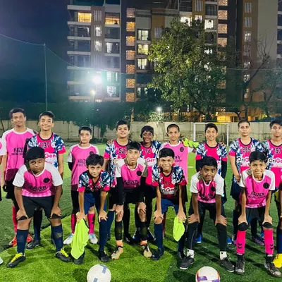 Our U15 and U17 boys teams after a competitive practice match against Kaizen FC. These matches against other skilled teams are essential for their development.