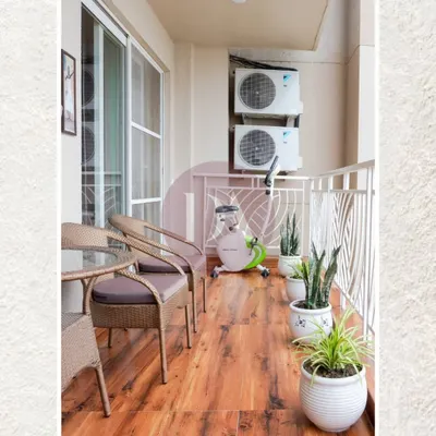 Even a compact balcony can be a peaceful retreat. We used warm wood-look flooring, comfortable seating, and a few potted plants to transform this space into a perfect spot for morning coffee or an evening workout.