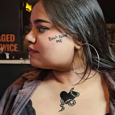 "Don't Blame Me." A fun, Reputation-era inspired look with a temporary snake and heart tattoo for a Taylor Swift themed party. I love creating these custom pieces for events.