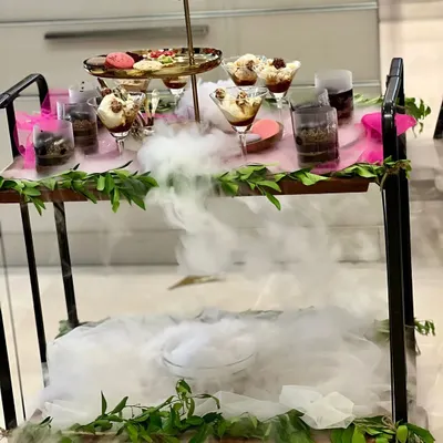 Make your dessert course a showstopper. This dramatic dessert cart, complete with dry ice for a magical effect, is perfect for adding a 'wow' element to any house party.