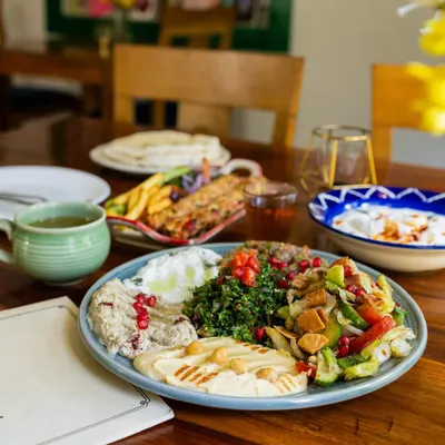 Experiencing the calm at Cafe Zubaan. This shot captures the ambiance of the cafe along with their beautiful food, telling a story of a relaxing dining experience. This is the kind of content we create for cafe promotions.