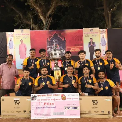 Our senior team celebrating as state champions, holding the first prize check of ₹51,000 and the winner's trophy.