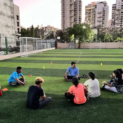 The work isn't over when the gloves come off. A post-training talk session on the field, where we discuss what we learned and how to improve mentally and physically.