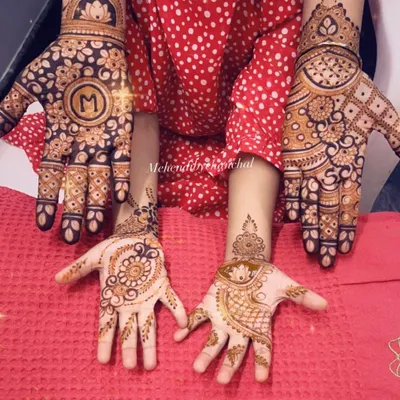 A happy Diwali moment! Mehendi for both mother and daughter, with a special little design for the tiny hands.