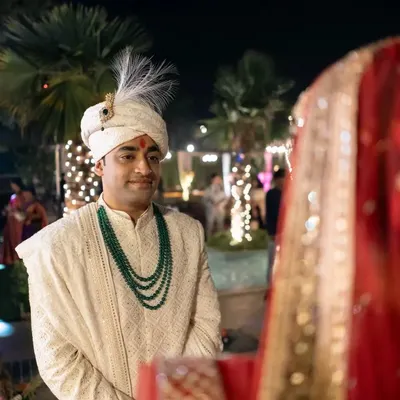 The groom's emotional and adoring gaze as he sees his bride for the first time. This is a powerful, once-in-a-lifetime moment.