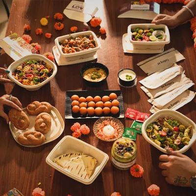 This is what a party catered by us looks like. A table full of delicious, healthy, and diverse options to please all your guests. You enjoy the celebration, we'll take care of the feast.