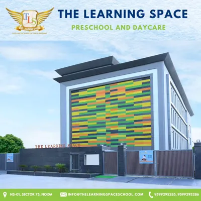 I believe a school should be a place of wonder. Our building's colorful facade is the first hint of the vibrant, playful, and creative learning that happens inside.