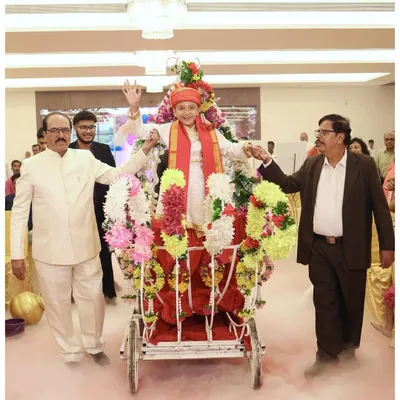 The grand entrance for a milestone birthday. I make sure to capture the big, show-stopping moments like this one, where Shreeyan arrives in a beautifully decorated cart, surrounded by smoke effects and cheering family. It’s a memory that truly deserves a spectacular photograph.