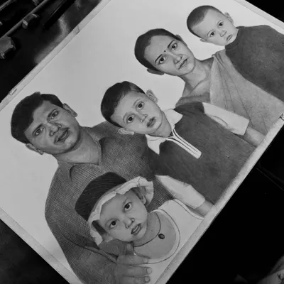 The final result of a commissioned A3 family portrait. It’s a beautiful way to have everyone in one frame, creating a memory that lasts longer than a photograph.